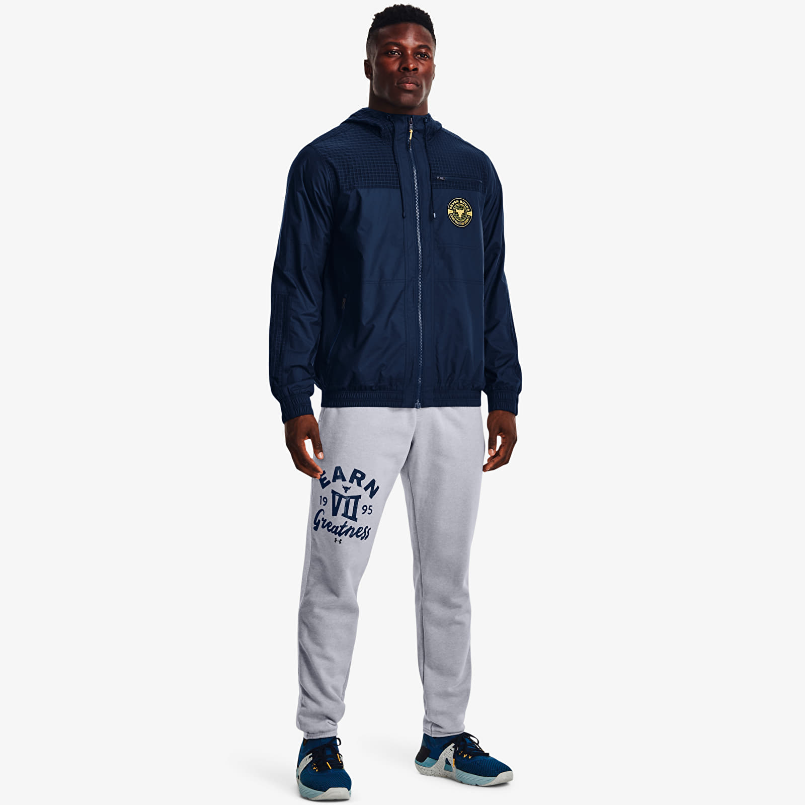 Dzsekik Under Armour Project Rock Q1 Woven Layer Academy/ Field Yellow/ White