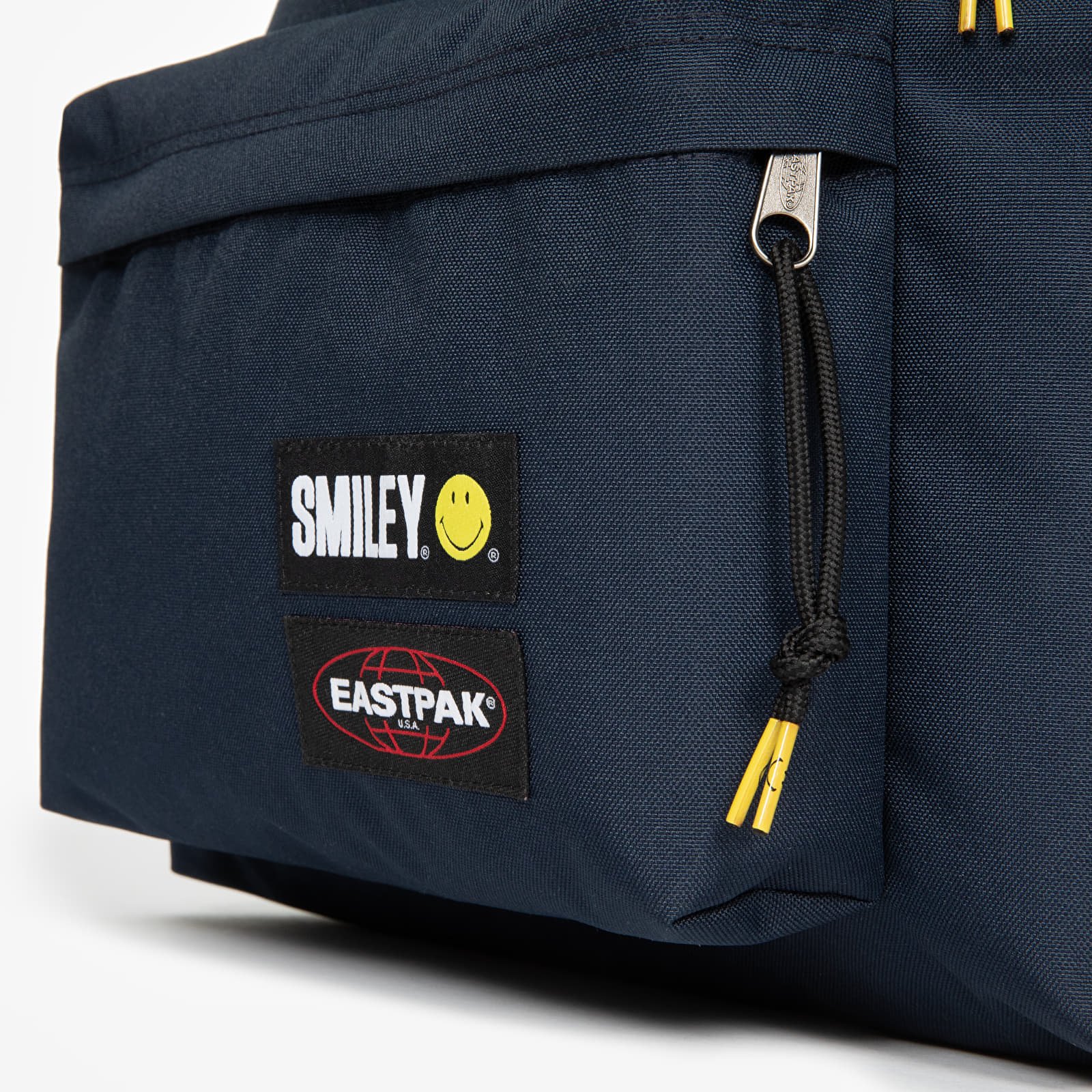 Nahrbtniki  EASTPAK Padded Pak'r Backpack Smiley Patch Marine
