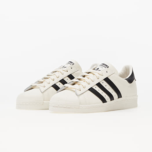 Adidas superstar black and white fake deals