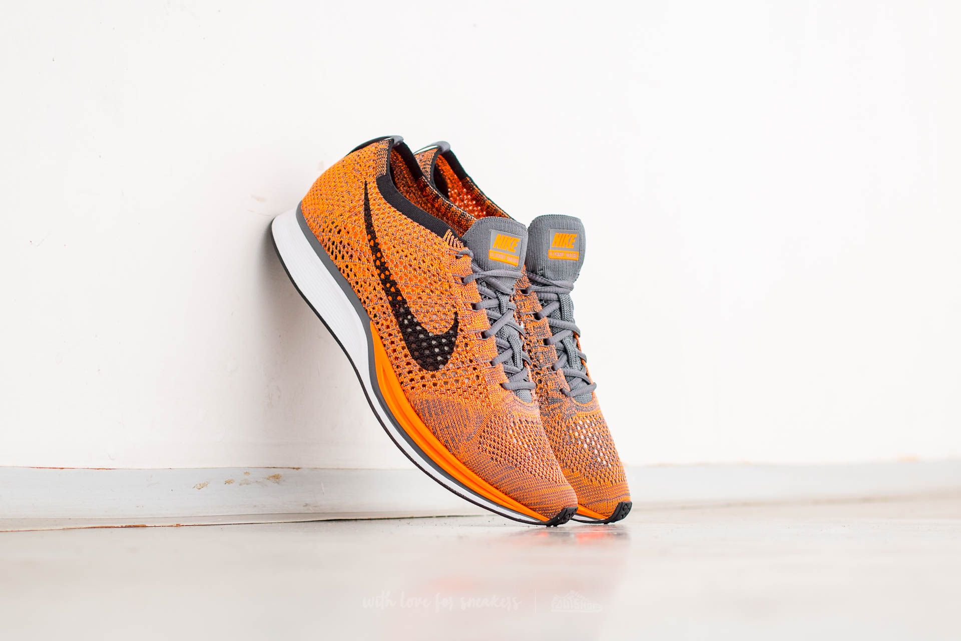 Flyknit racer orange 2025