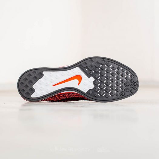 Nike flyknit trainer orange hotsell