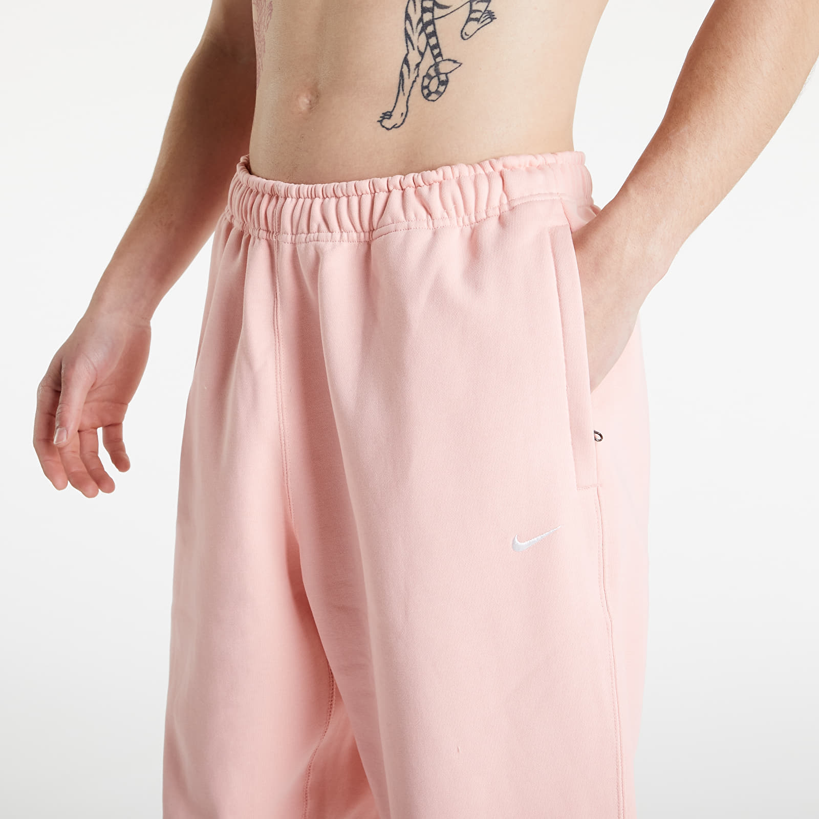Pants NikeLab Solo Swoosh Men's Fleece Pants Bleached Coral/ White