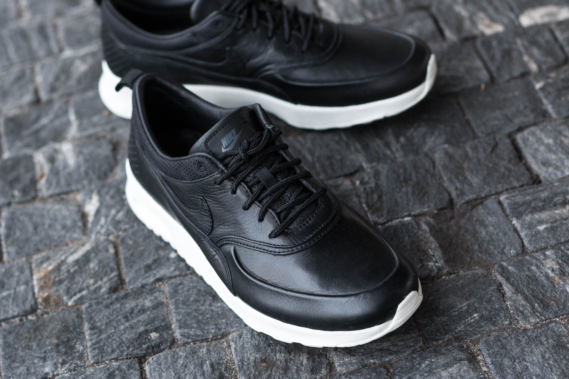 Nike air max thea black leather hotsell