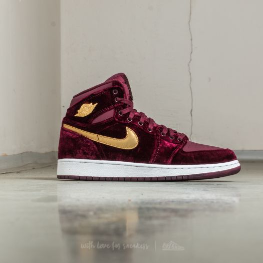 Maroon gold jordans 2025