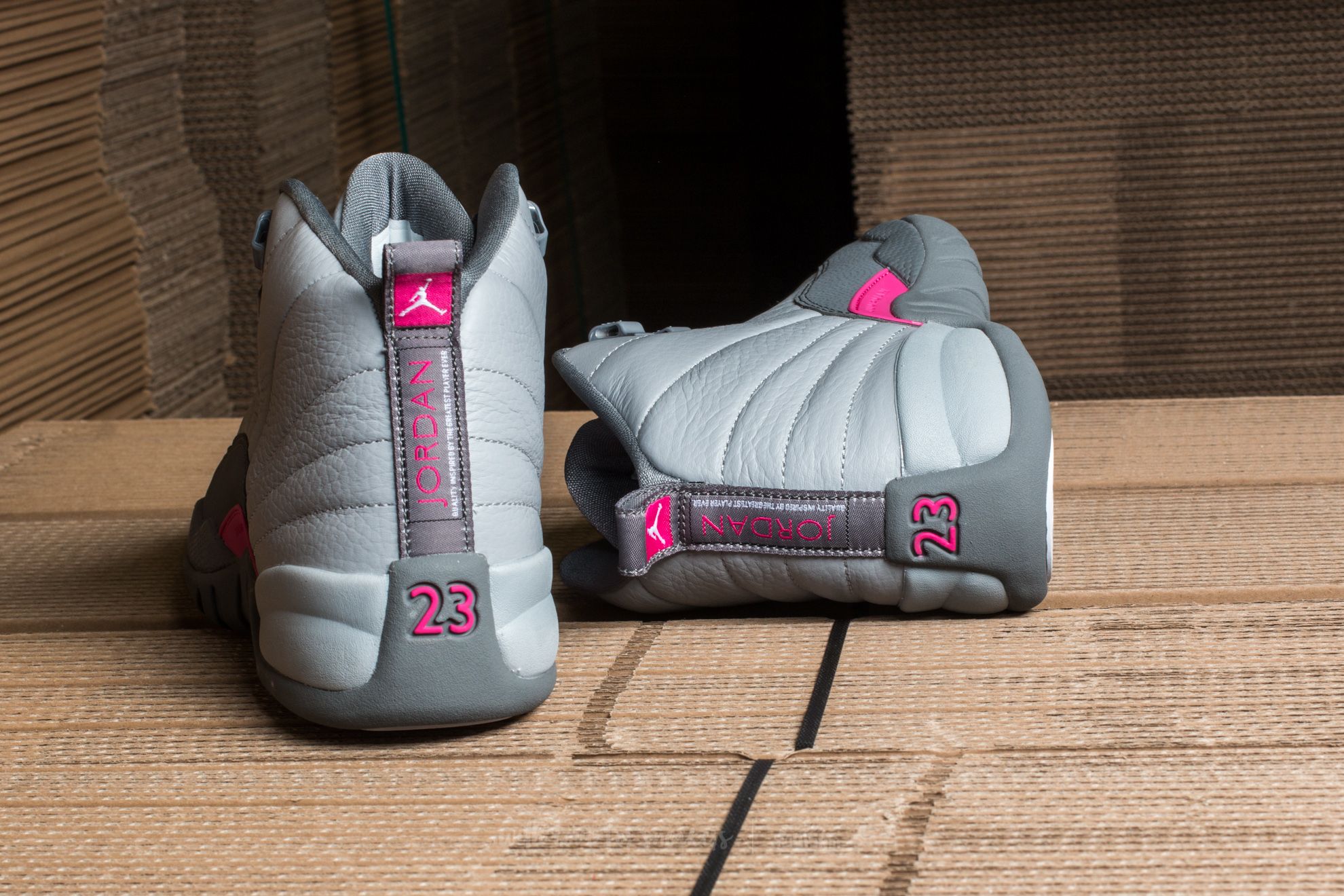 Women s shoes Air Jordan 12 Retro GG Wolf Grey Vivid Pink Cool Grey Footshop