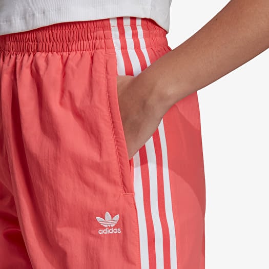 Adidas originals adicolor locked up hot sale logo track pants in red