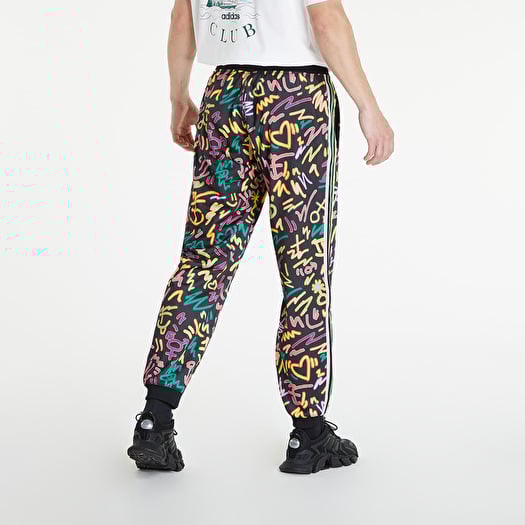 Pants and jeans adidas Love Unites Print Track Pants Multicolor Footshop