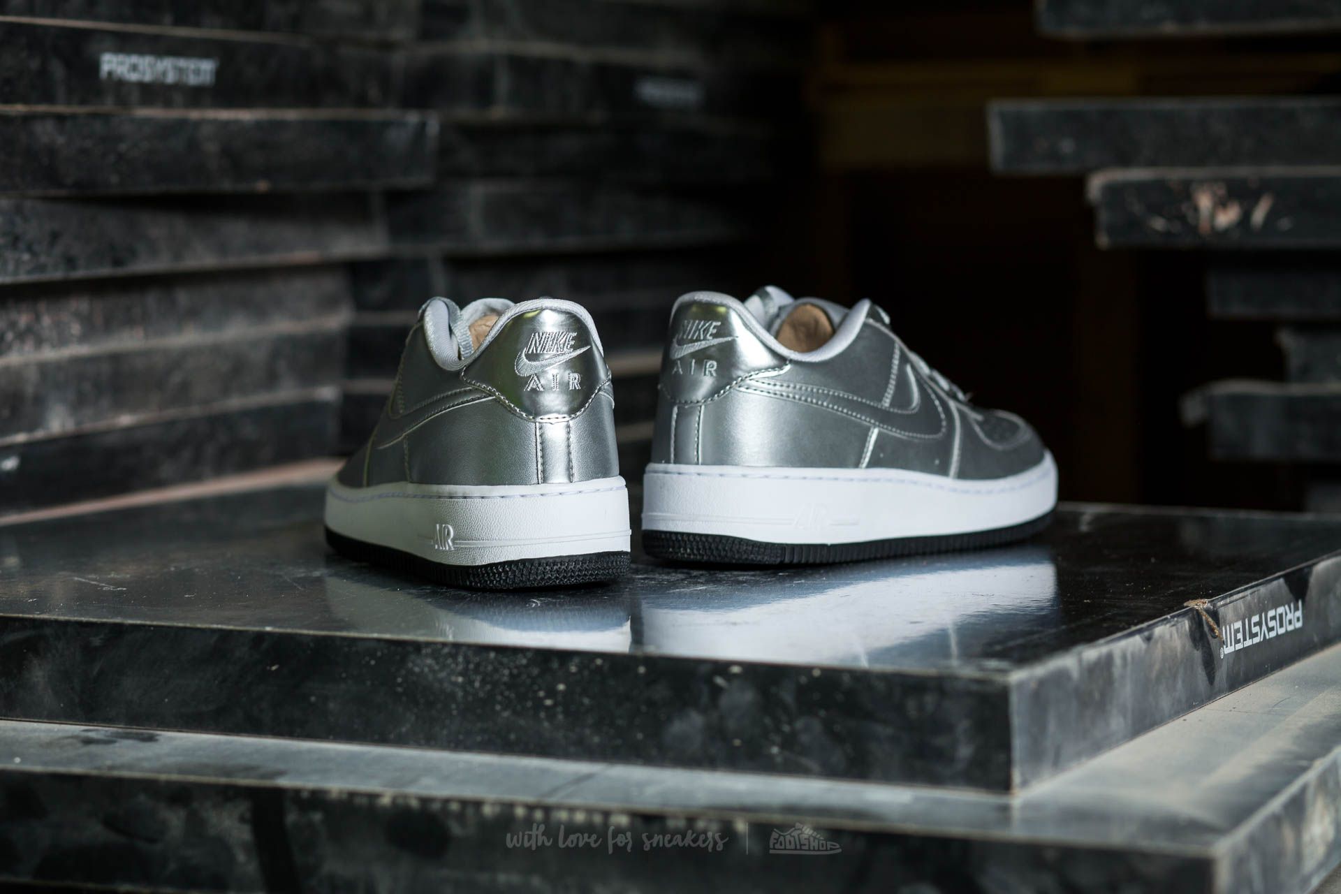 Women s shoes Nike Air Force 1 SE GS Metallic Silver Footshop