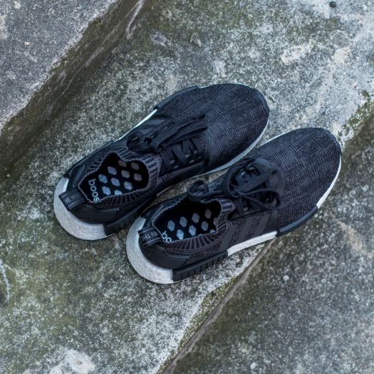 Nmd triple black on ungrassed foot