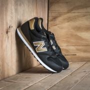 Women s shoes New Balance GW500KG Black Gold Footshop