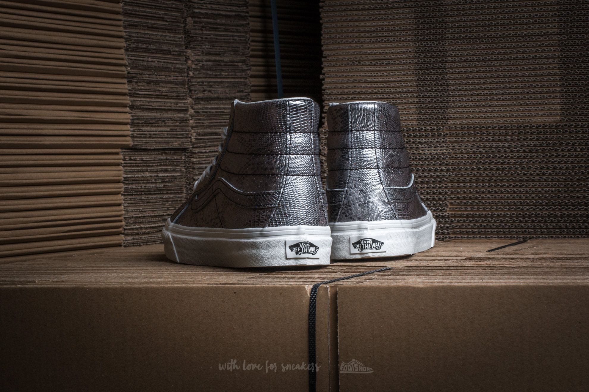 Black and silver vans hotsell