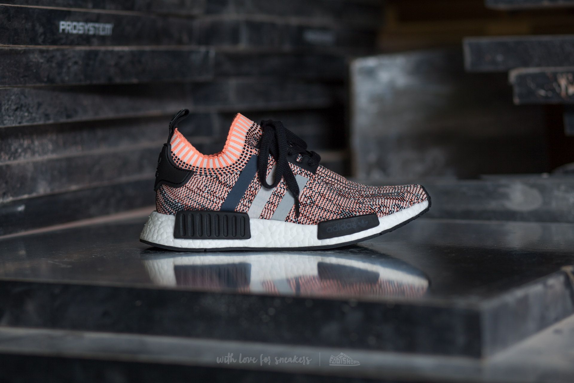 Kengät adidas NMD_R1 W Primeknit Core Black/ Clear Onix/ Sun Glow