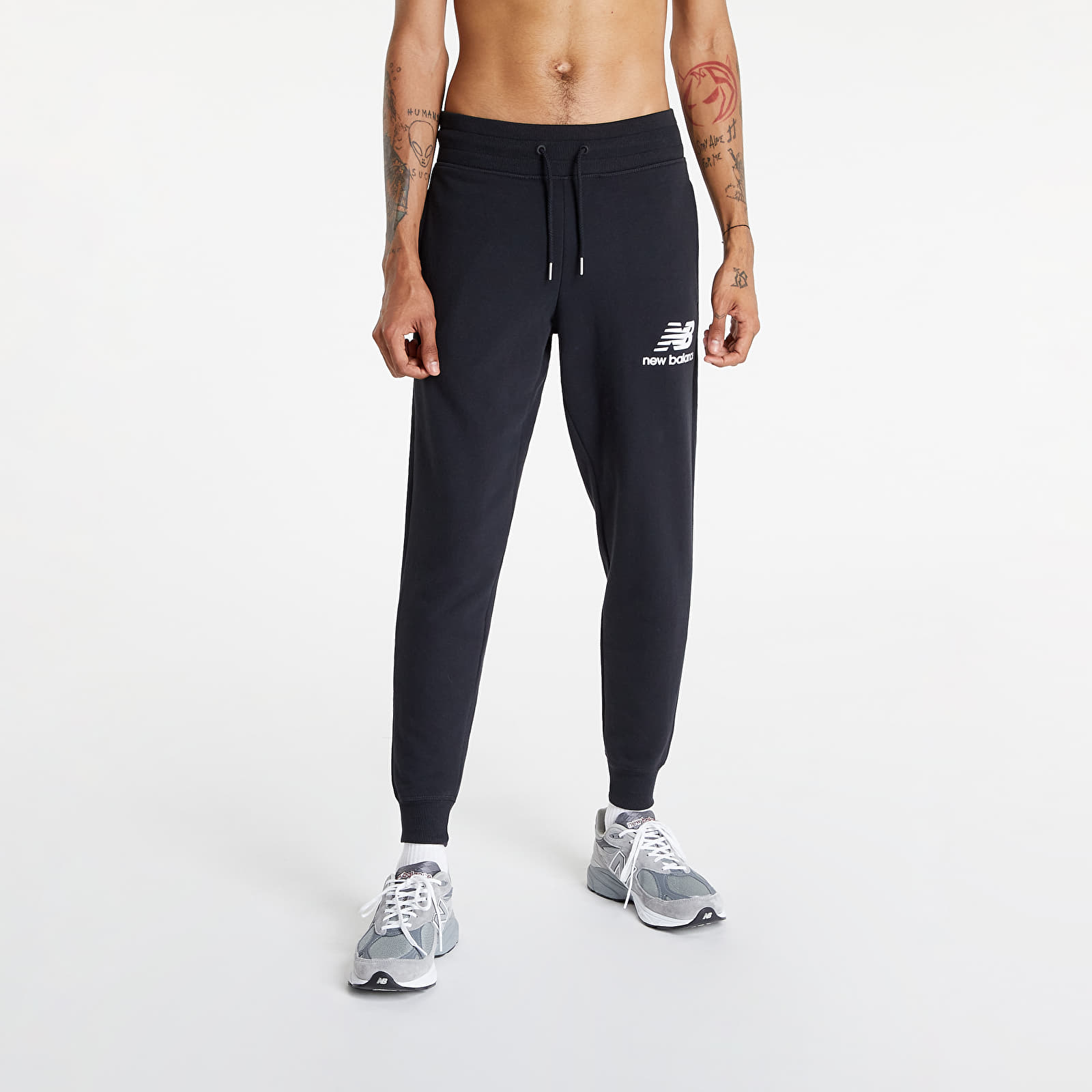 Nadrágok New Balance Essentials Stacked Logo Sweatpant Black