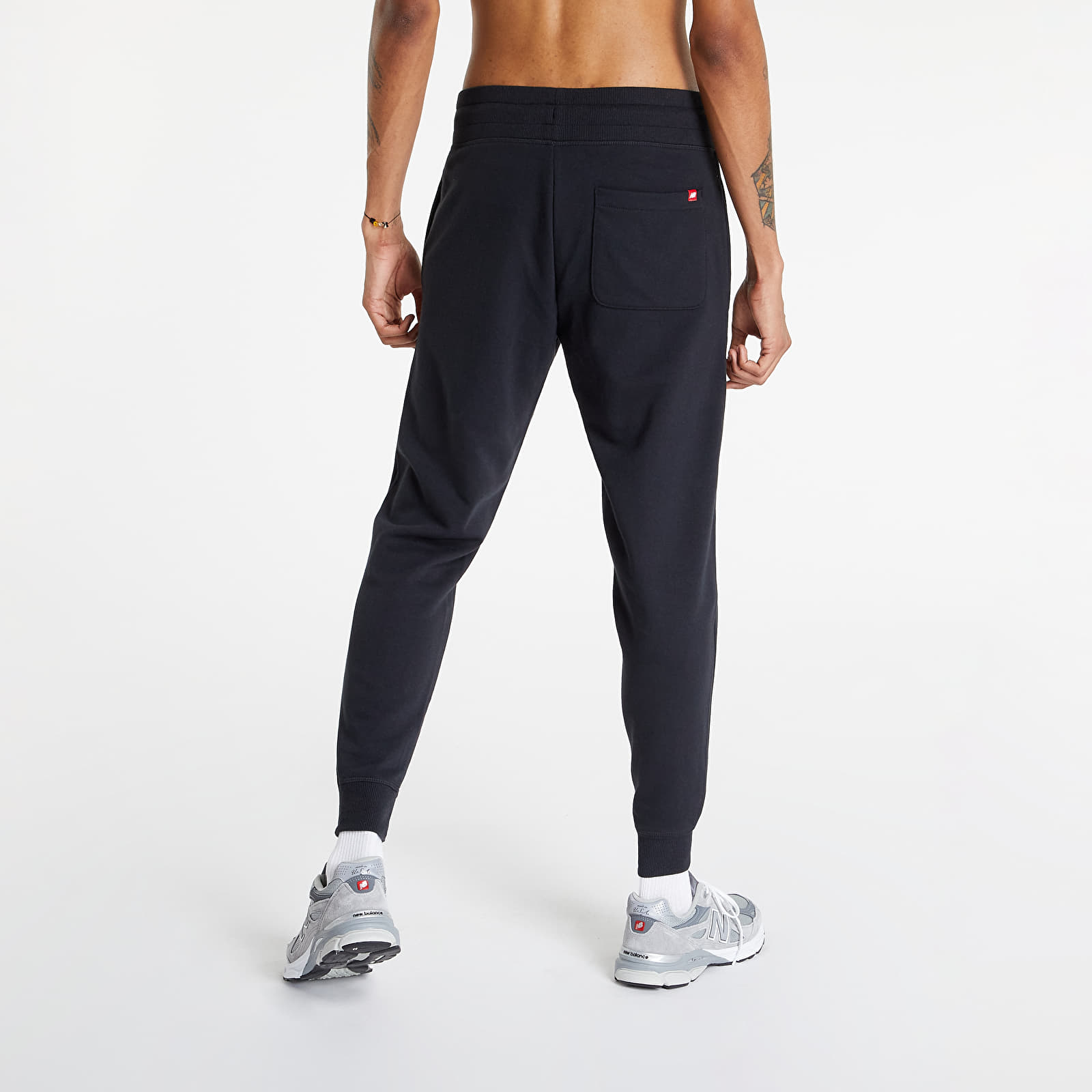 Nadrágok New Balance Essentials Stacked Logo Sweatpant Black