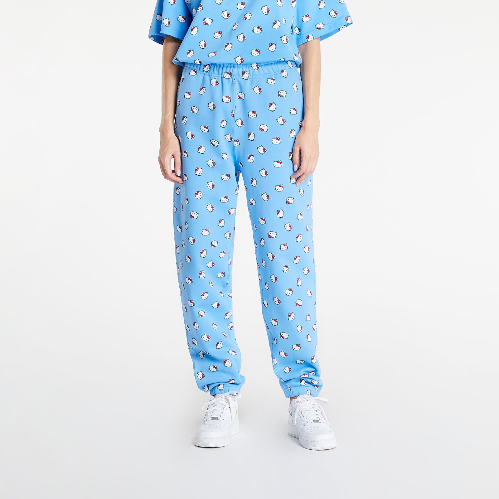 Pantaloni și blugi Nike Sportswear x Hello Kitty Sweat Fleece Pants UNISEX University Blue