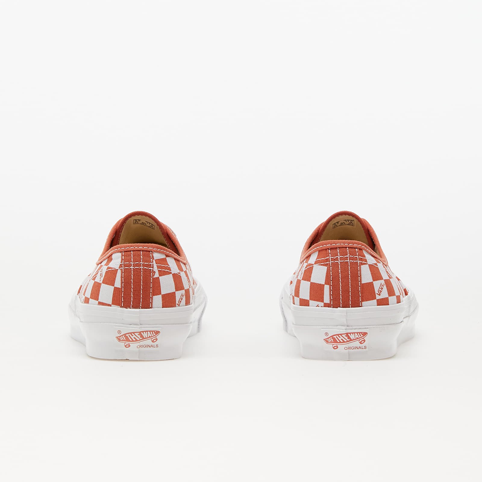 Orange vans slip on on sale