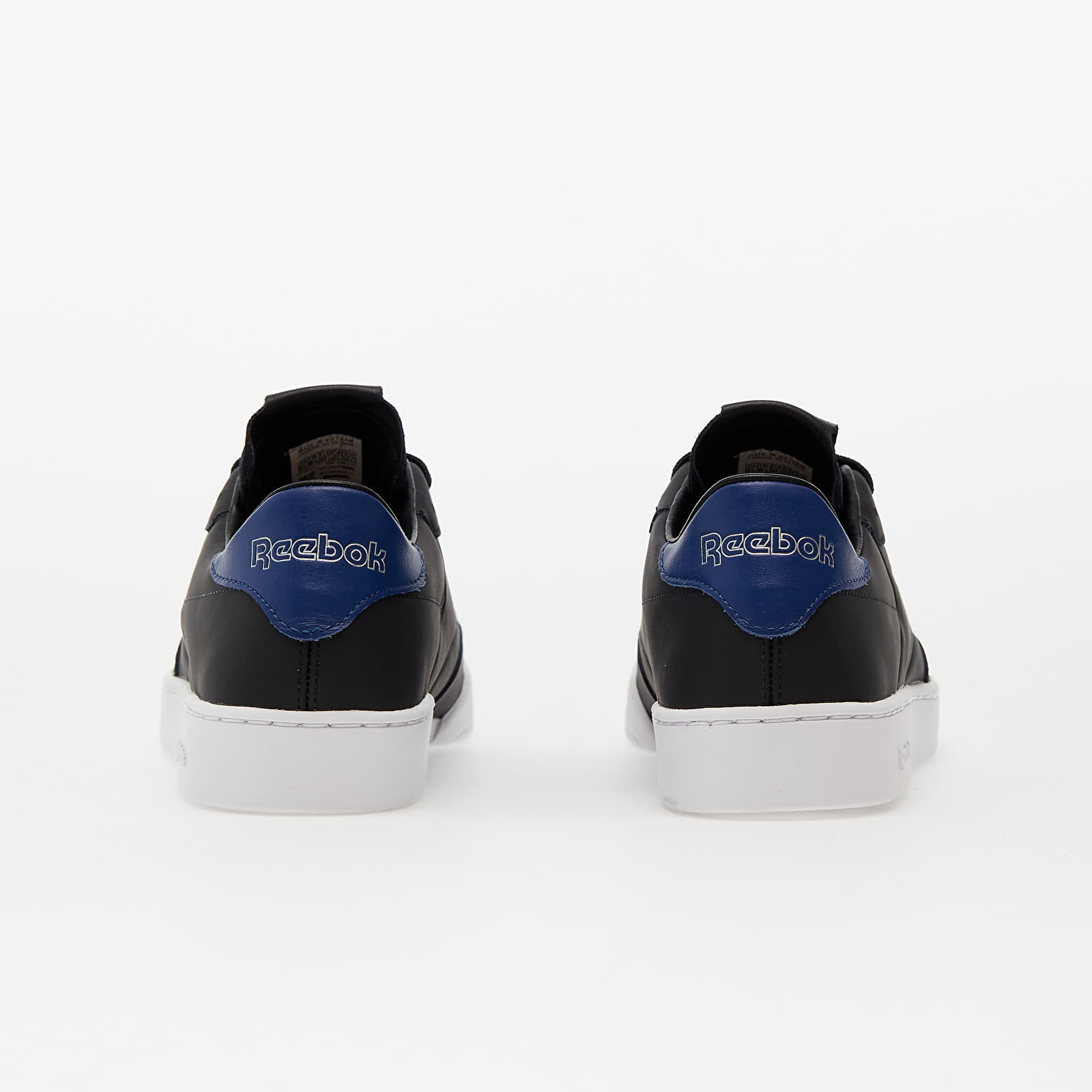 Reebok clean ultk shop trainers in black