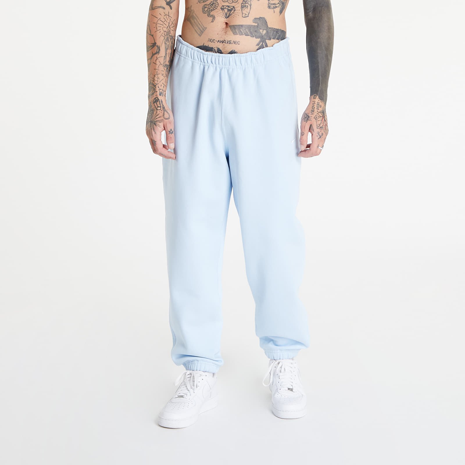 Pants and jeans Nike Solo Swoosh Men's Fleece Pants Celestine Blue/ White