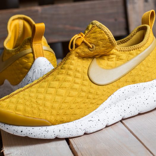 Nike gold dart top