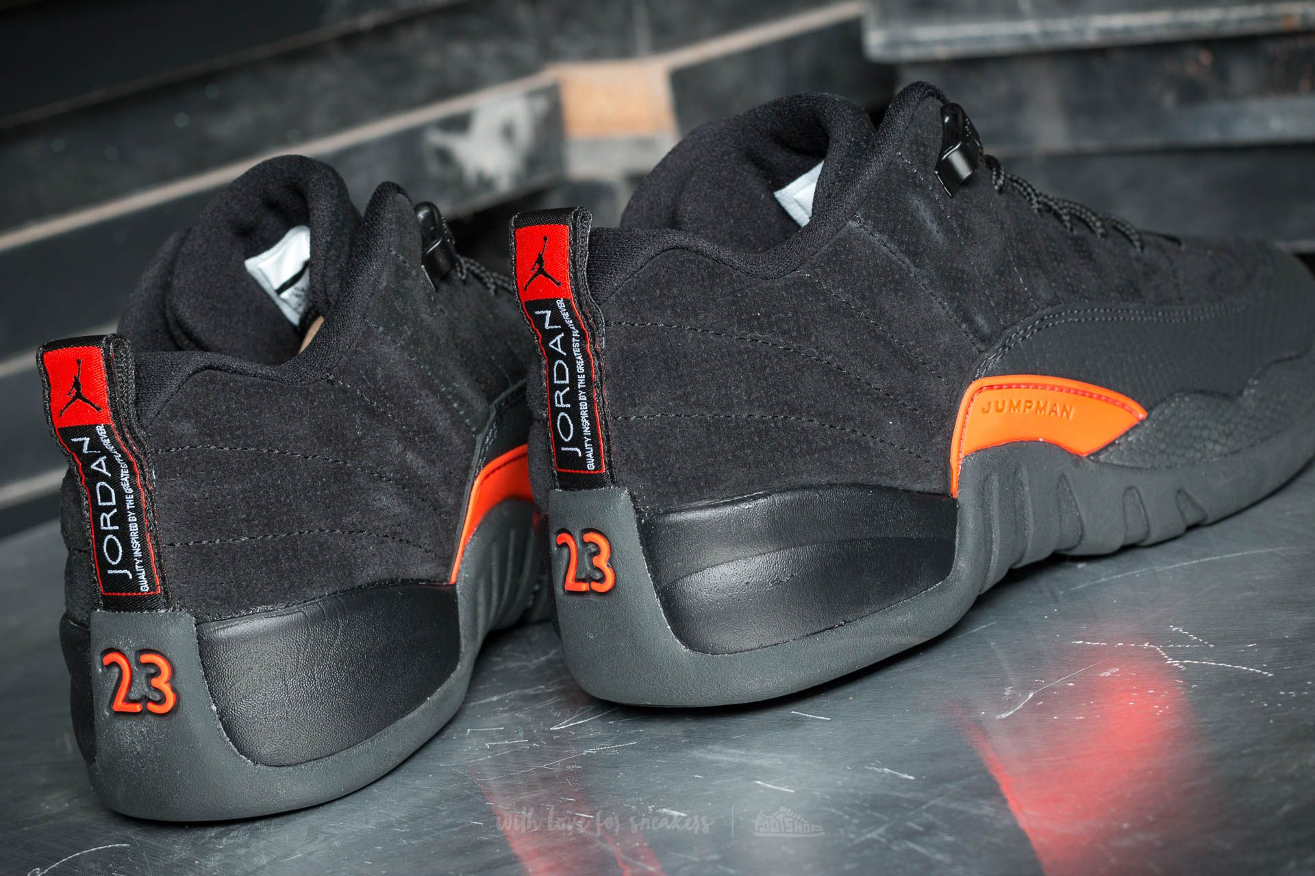 Jordan 12 low black on sale orange