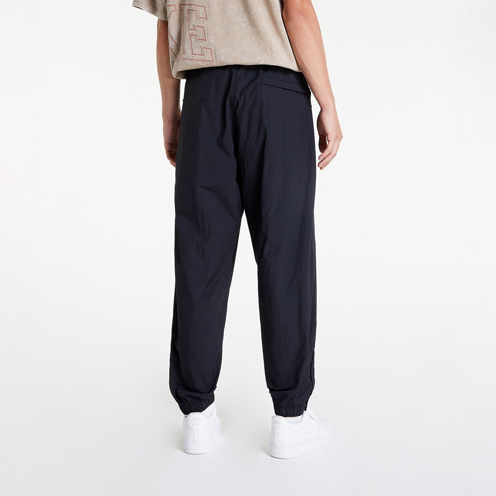 Farmerek és nadrágok Nike Sportswear Solo Swoosh Men's Track Pants Black/ White