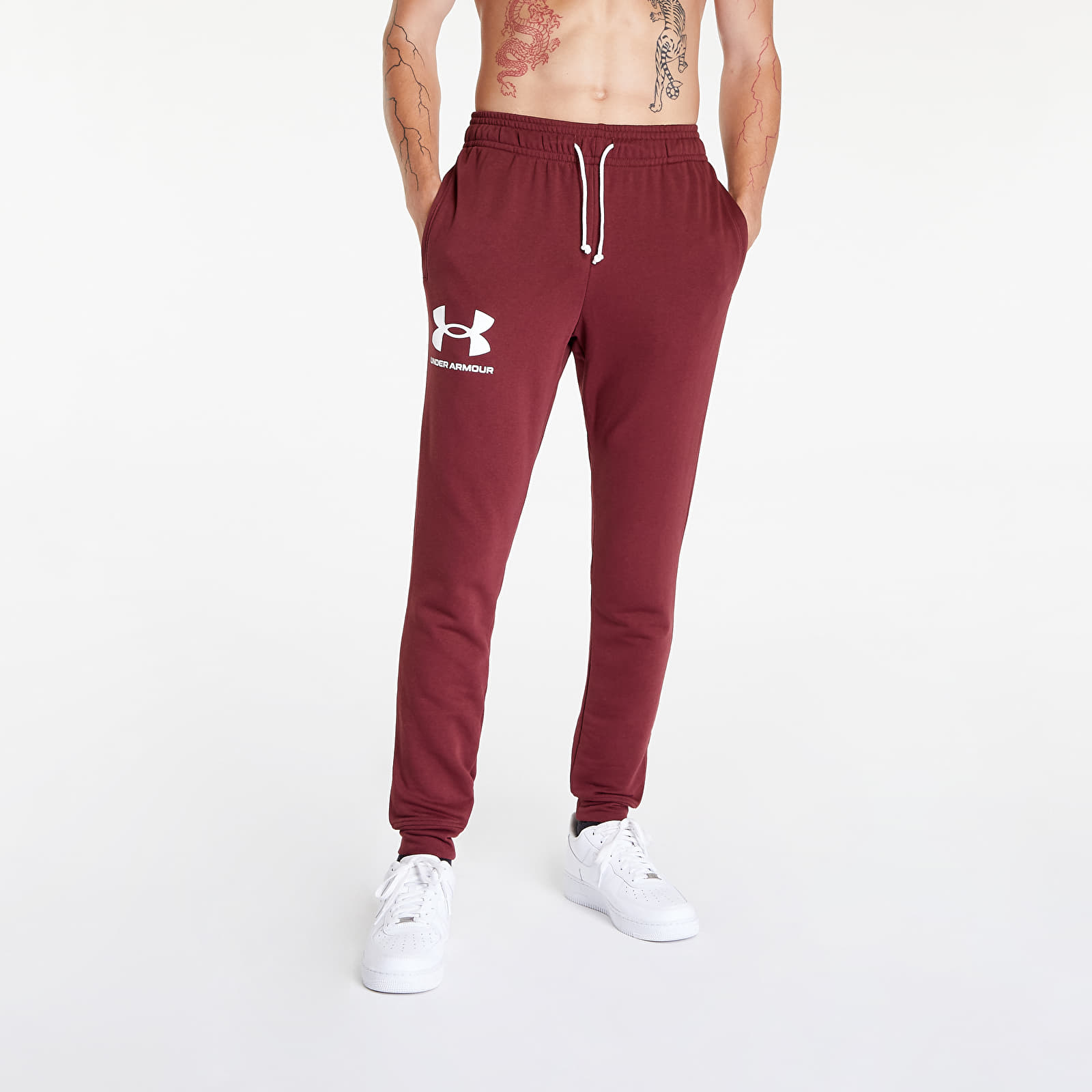 Pants and jeans Under Armour Rival Terry Jogger Chestnut Red/ Onyx White