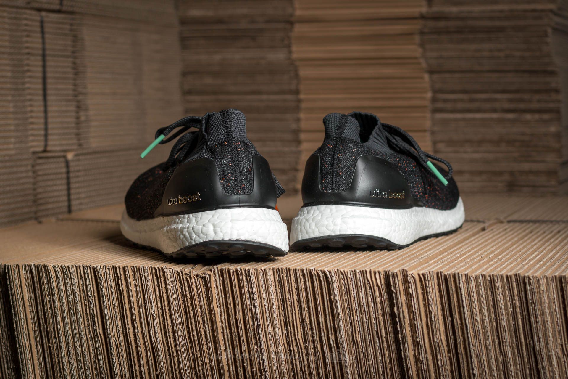 Ultra boost cheap uncaged multicolor black