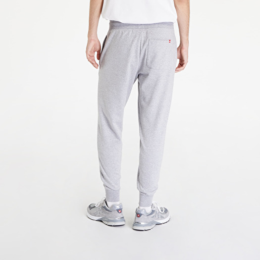 Pants and jeans New Balance Essentials Stacked Logo Sweatpant Athletic Grey  | Footshop