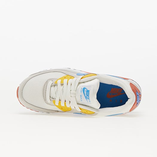 Light blue and deals yellow nike shoes