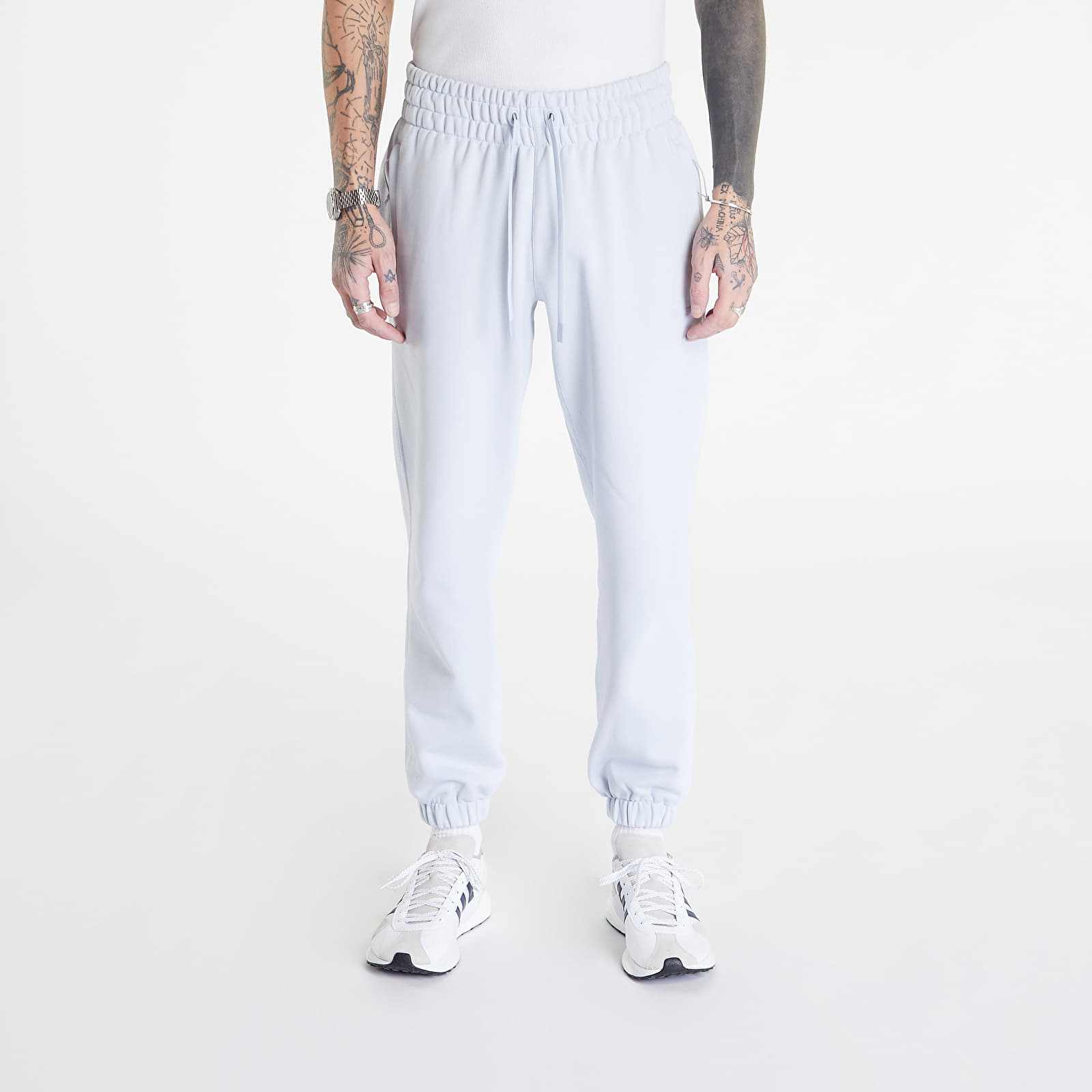 Džíny a kalhoty adidas Originals Pharrell Williams Basics Pant Halo Blue