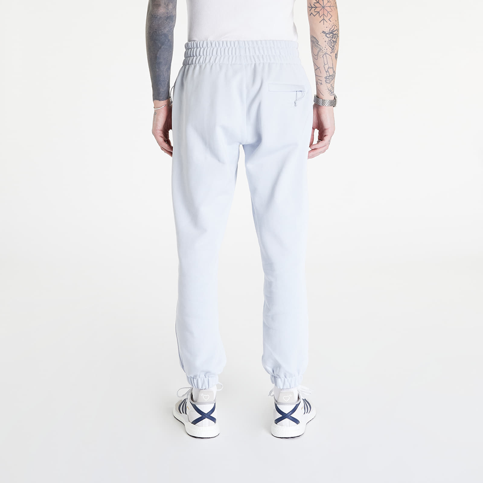 Traperice i hlače adidas Originals Pharrell Williams Basics Pant Halo Blue