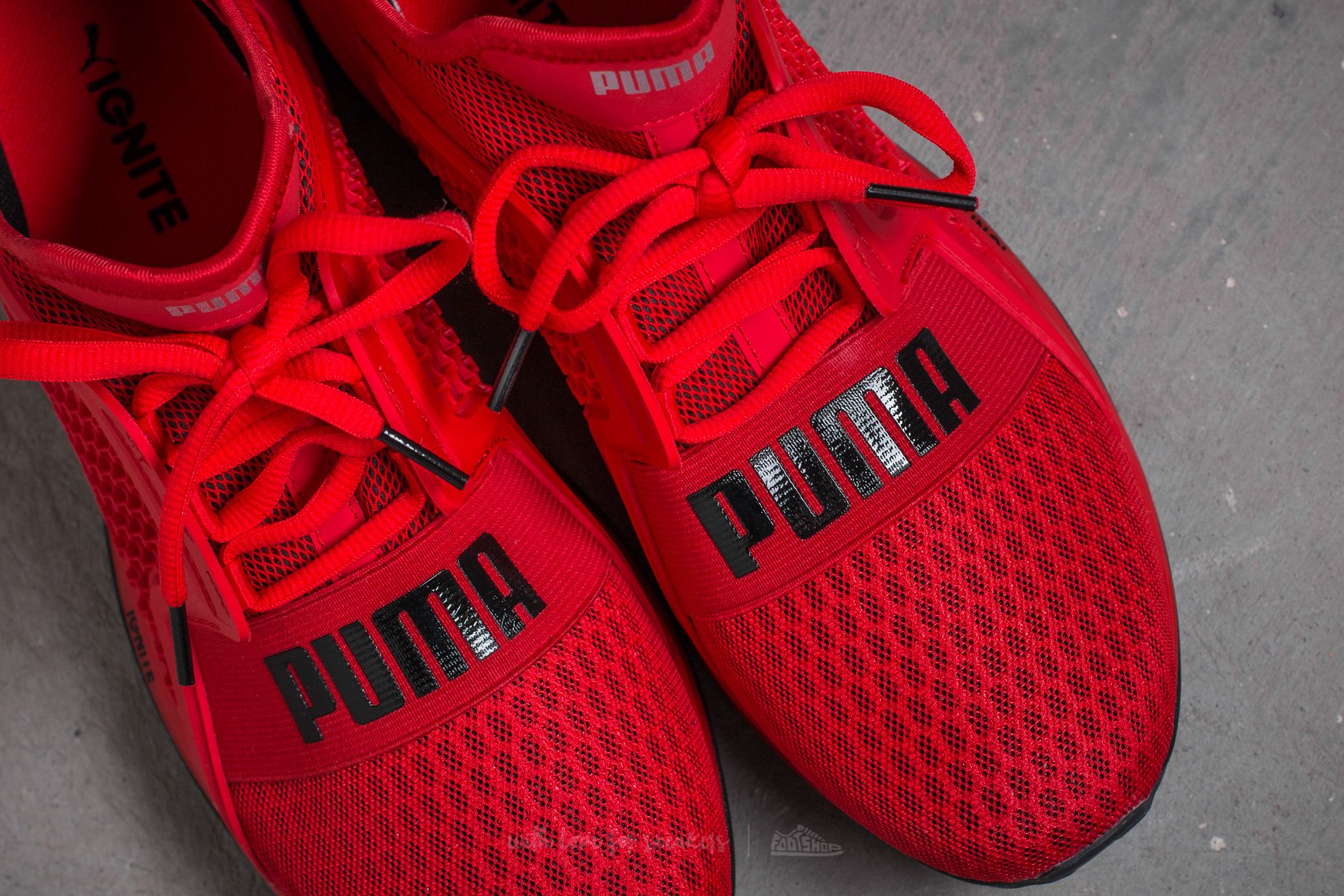 Puma red color shoes top