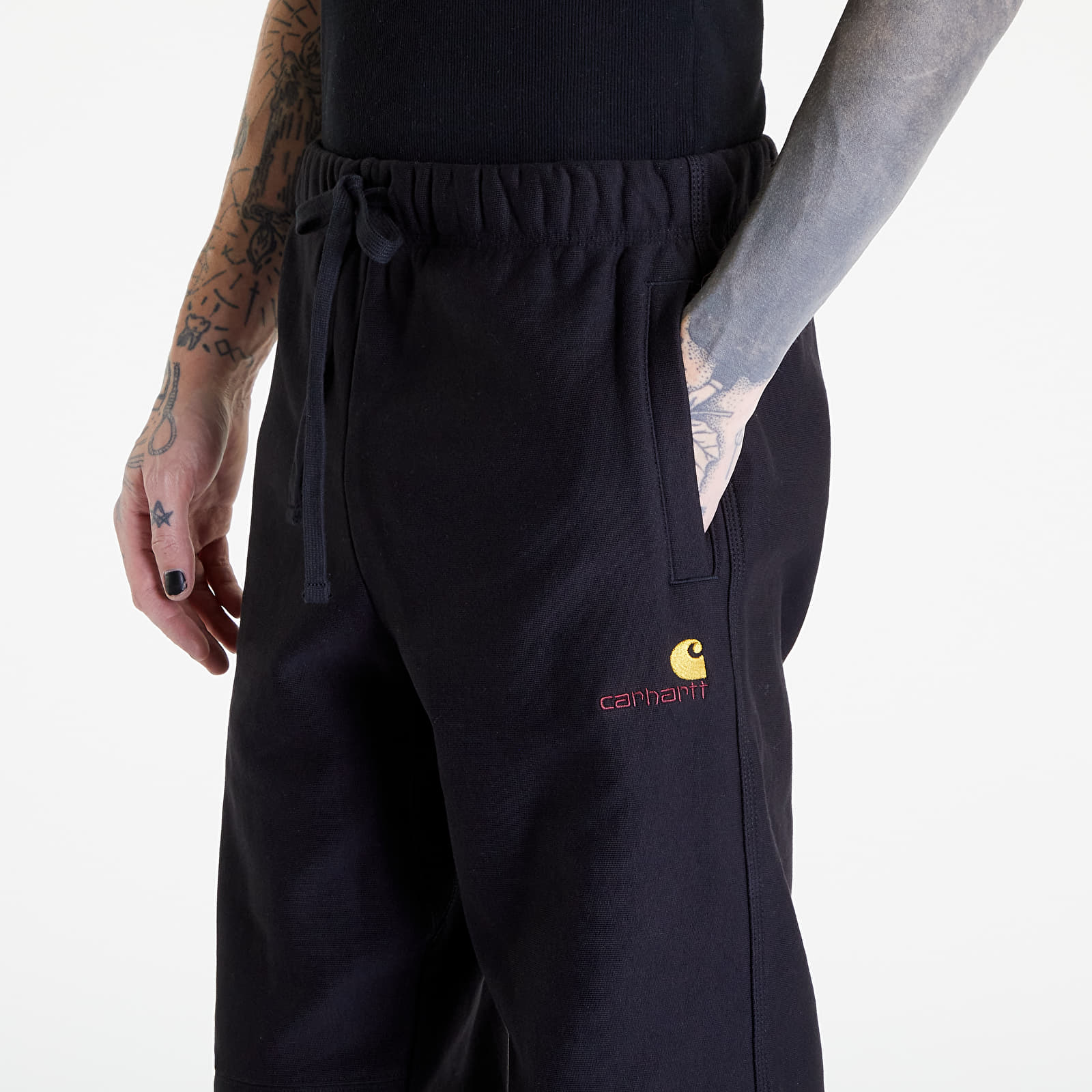 Farmerek és nadrágok Carhartt WIP American Script Jogging Pant Black
