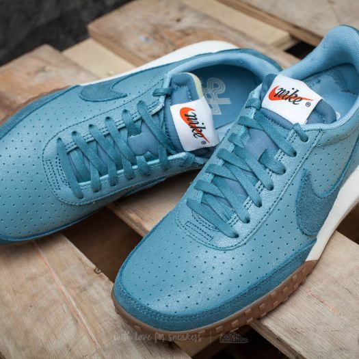 blue and orange roshe