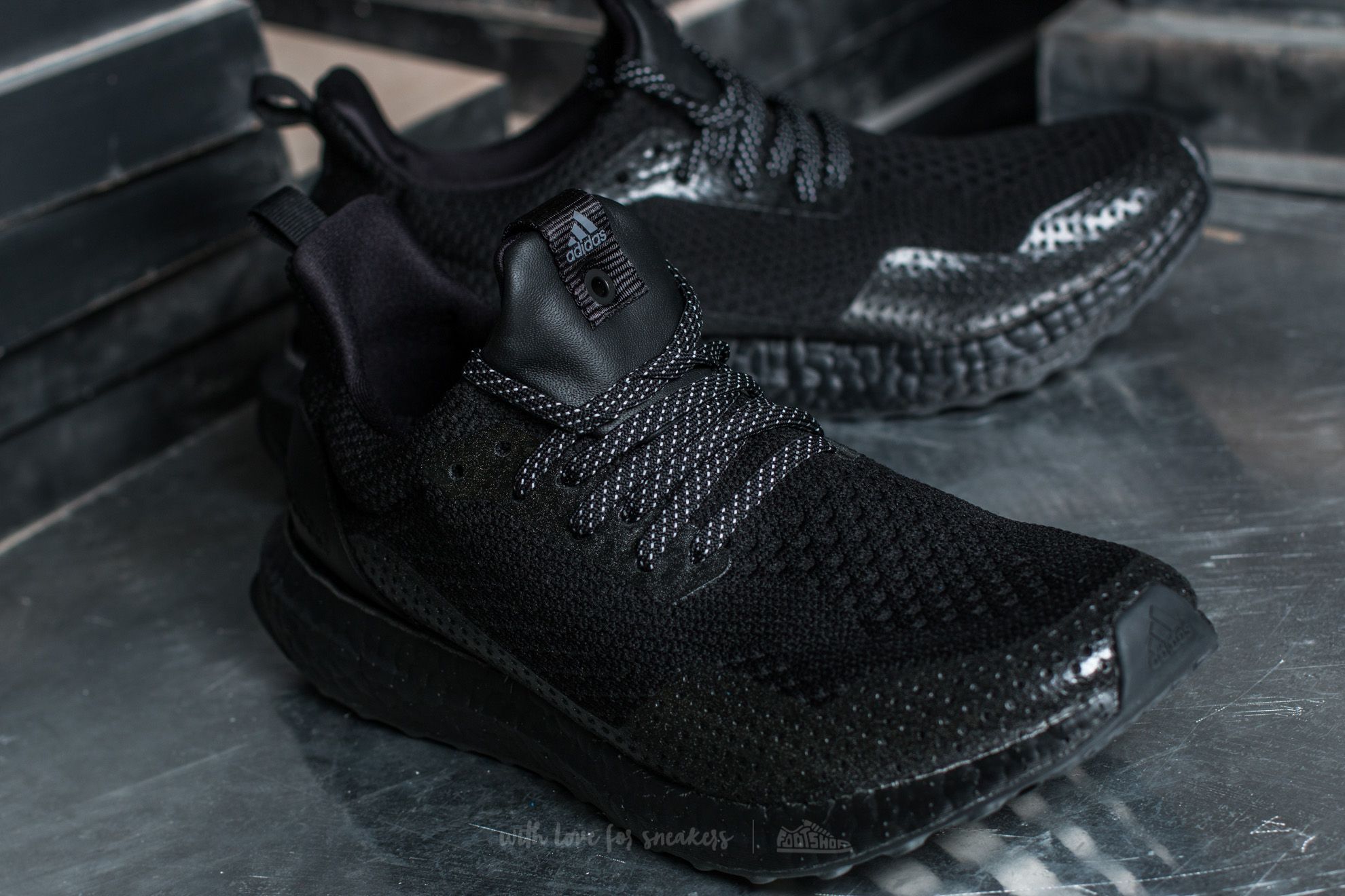 Haven x adidas ultra store boost uncaged triple black