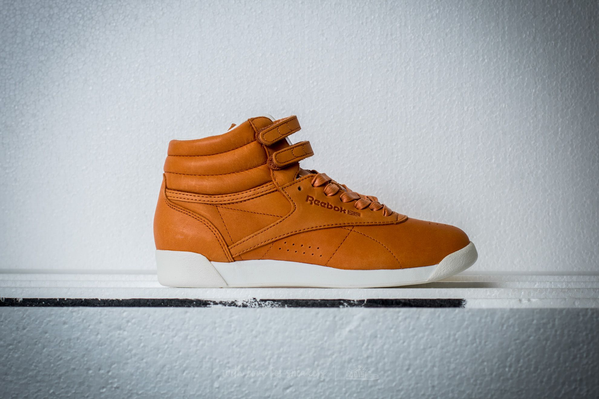 Women s shoes Reebok Freestyle Hi x FACE Stockholm Courage Wisdom Footshop