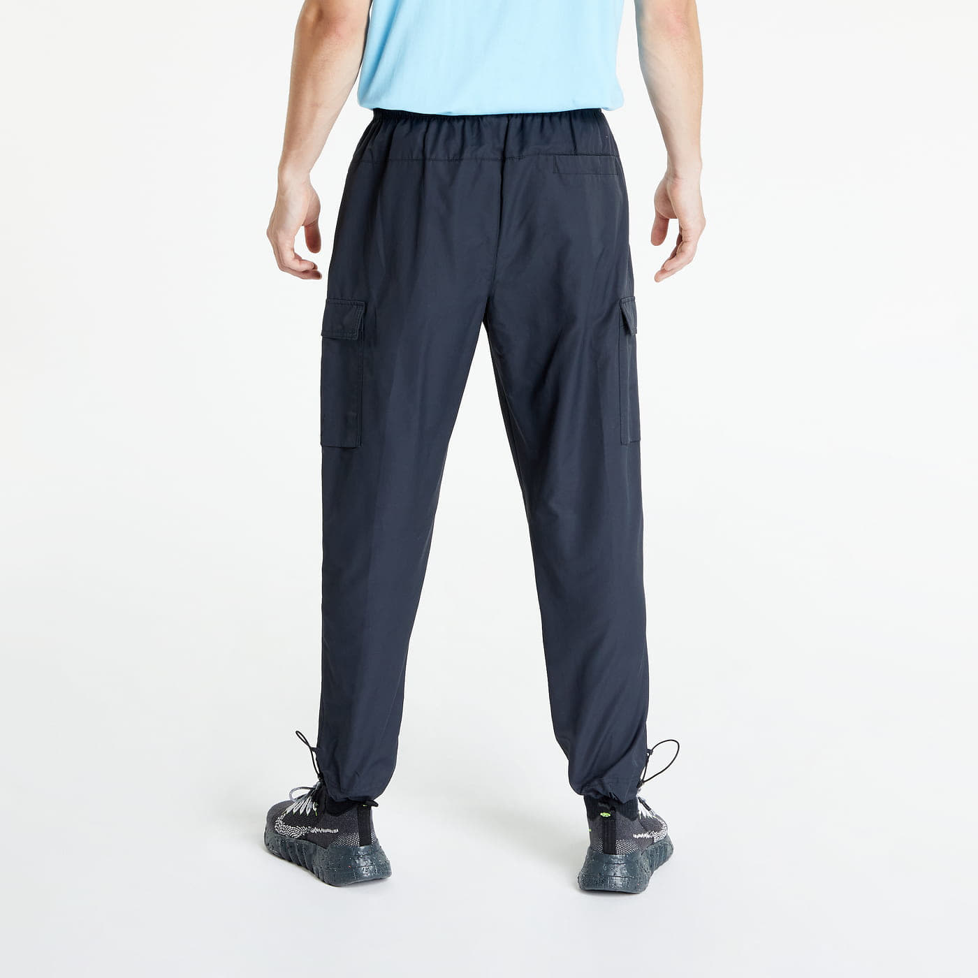 Träningsbyxor i nylon Nike Sportswear Repeat Woven Trousers Black