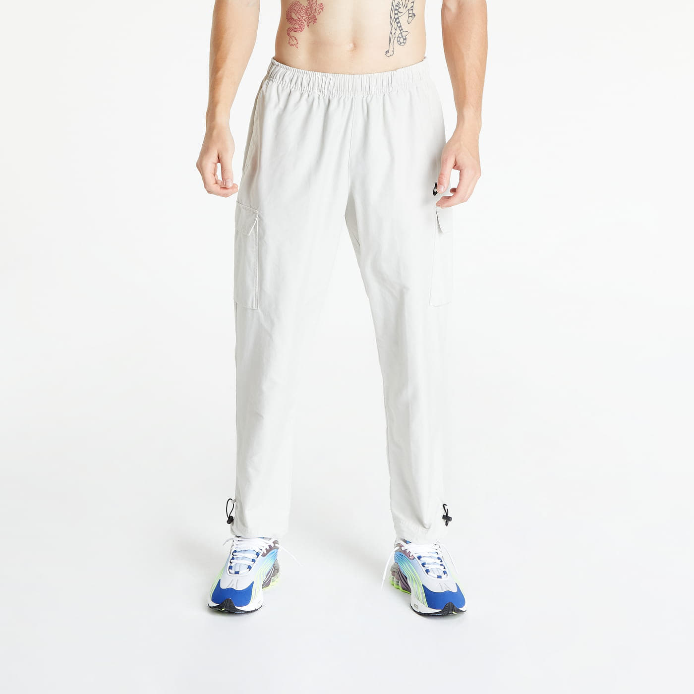 Pantaloni sportivi in nylon Nike Sportswear Repeat Woven Trousers White