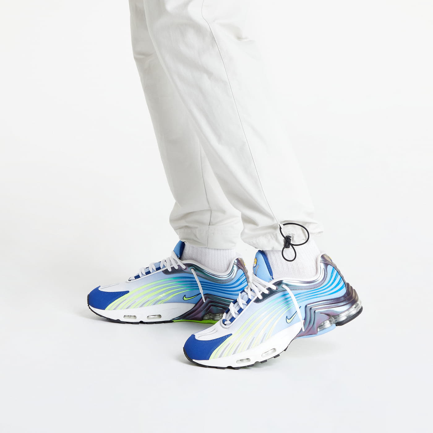 Pantaloni sportivi in nylon Nike Sportswear Repeat Woven Trousers White