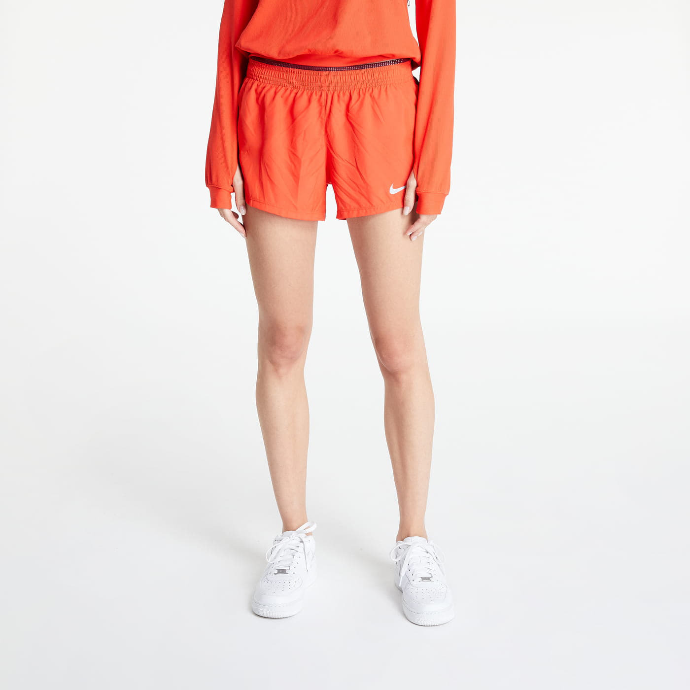 Levně Nike 10K Shorts Orange