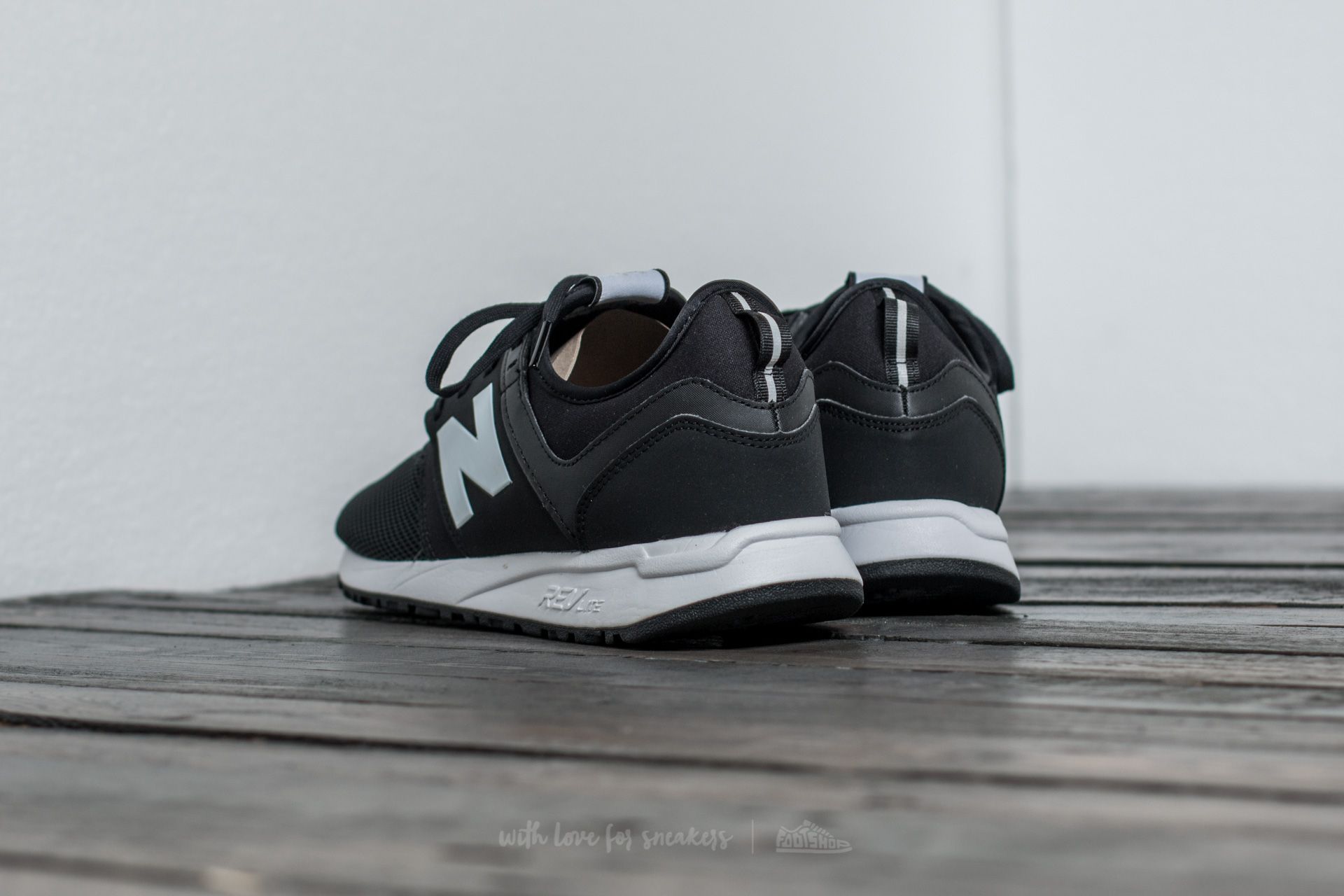 Men s shoes New Balance 247 Black White Footshop