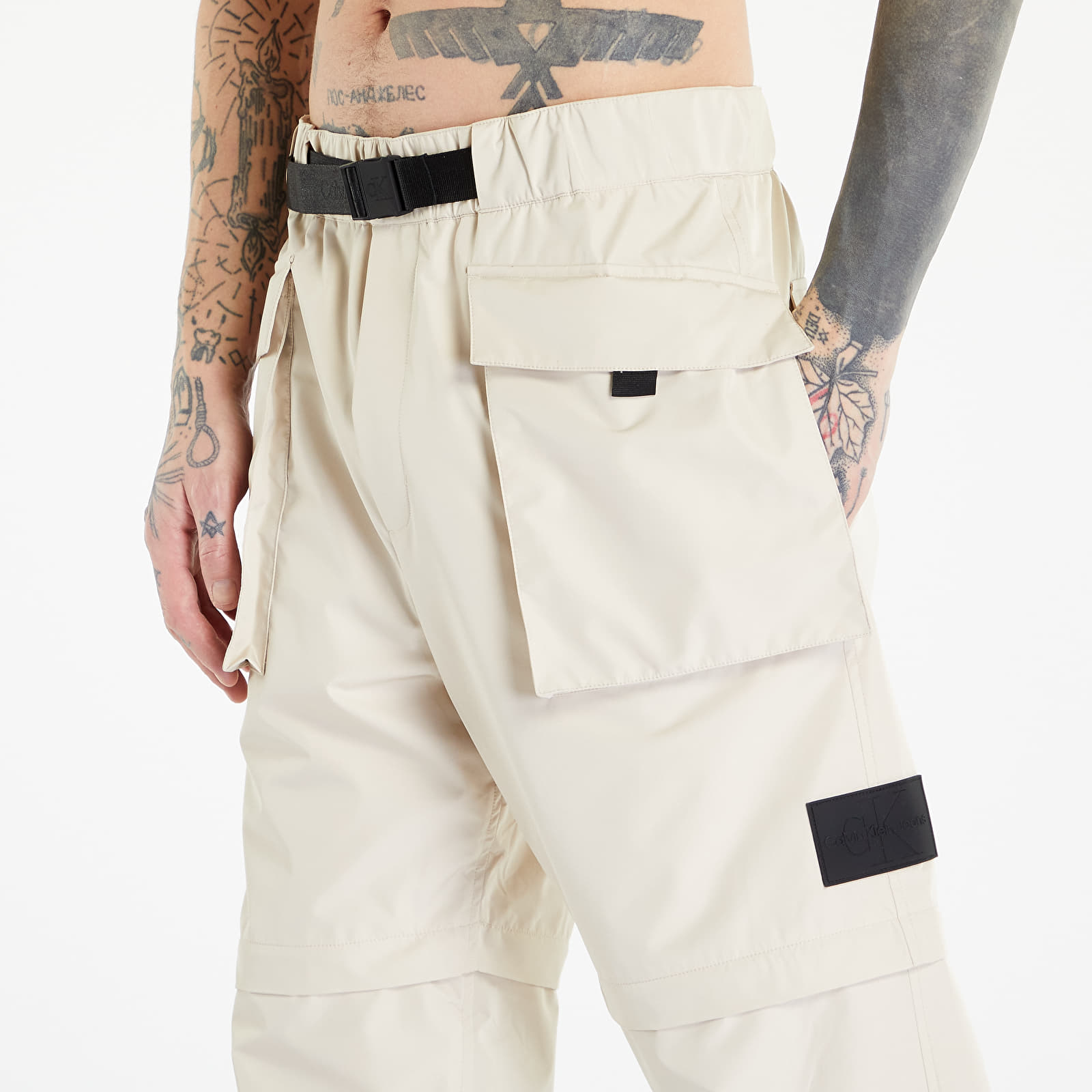 Pantaloni și blugi Calvin Klein Jeans Multifunctional Zip Woven Pants Beige