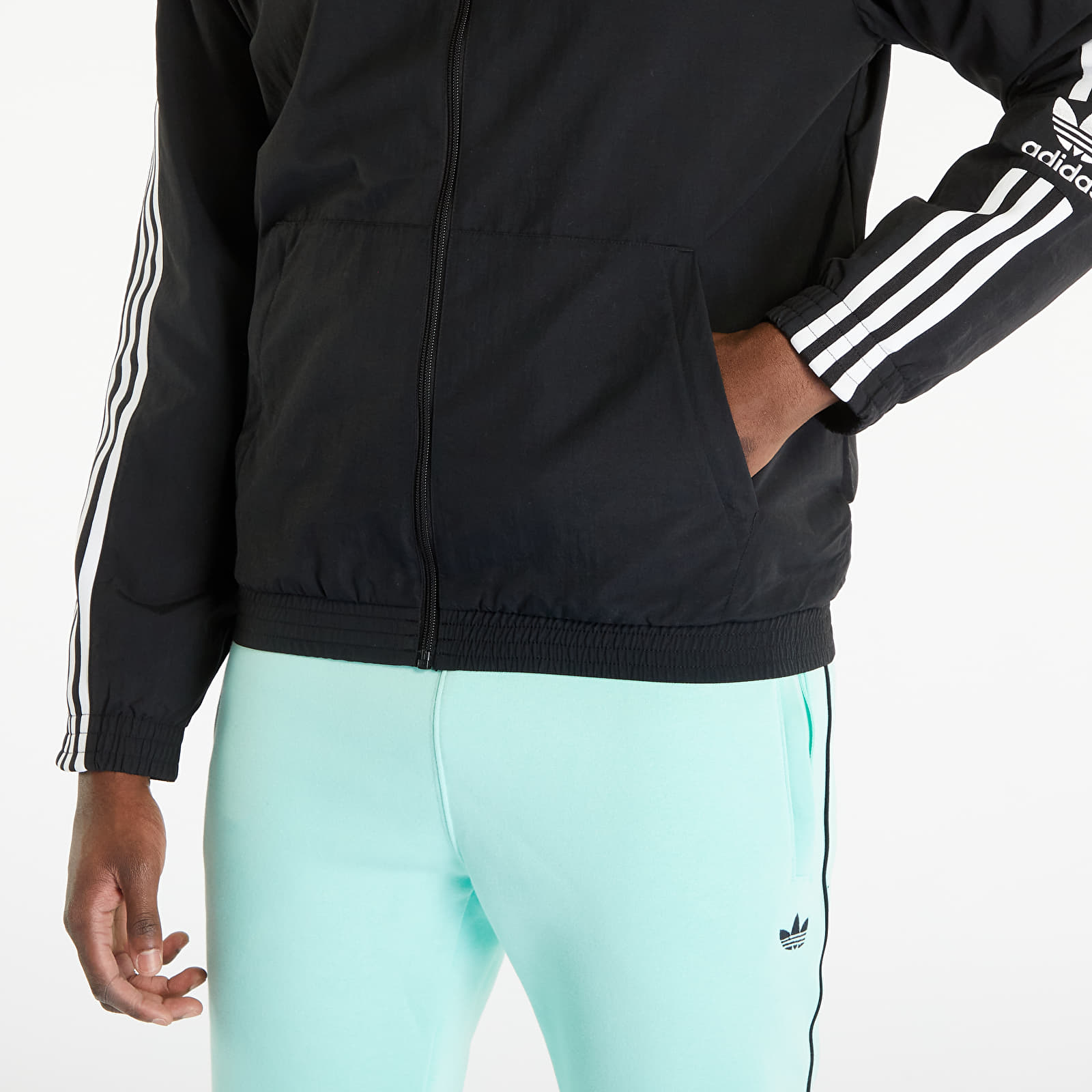 Adidas originals locked up logo track jacket in black hotsell
