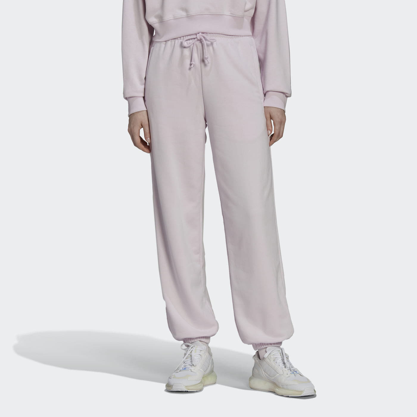 Levně adidas Originals Sweatpants Almost Pink