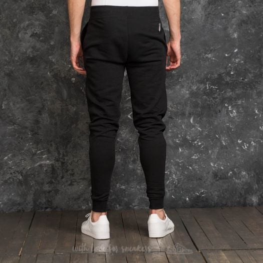 Pants and jeans New Era NFL NOS Oakland Raiders Track Pant Black Footshop