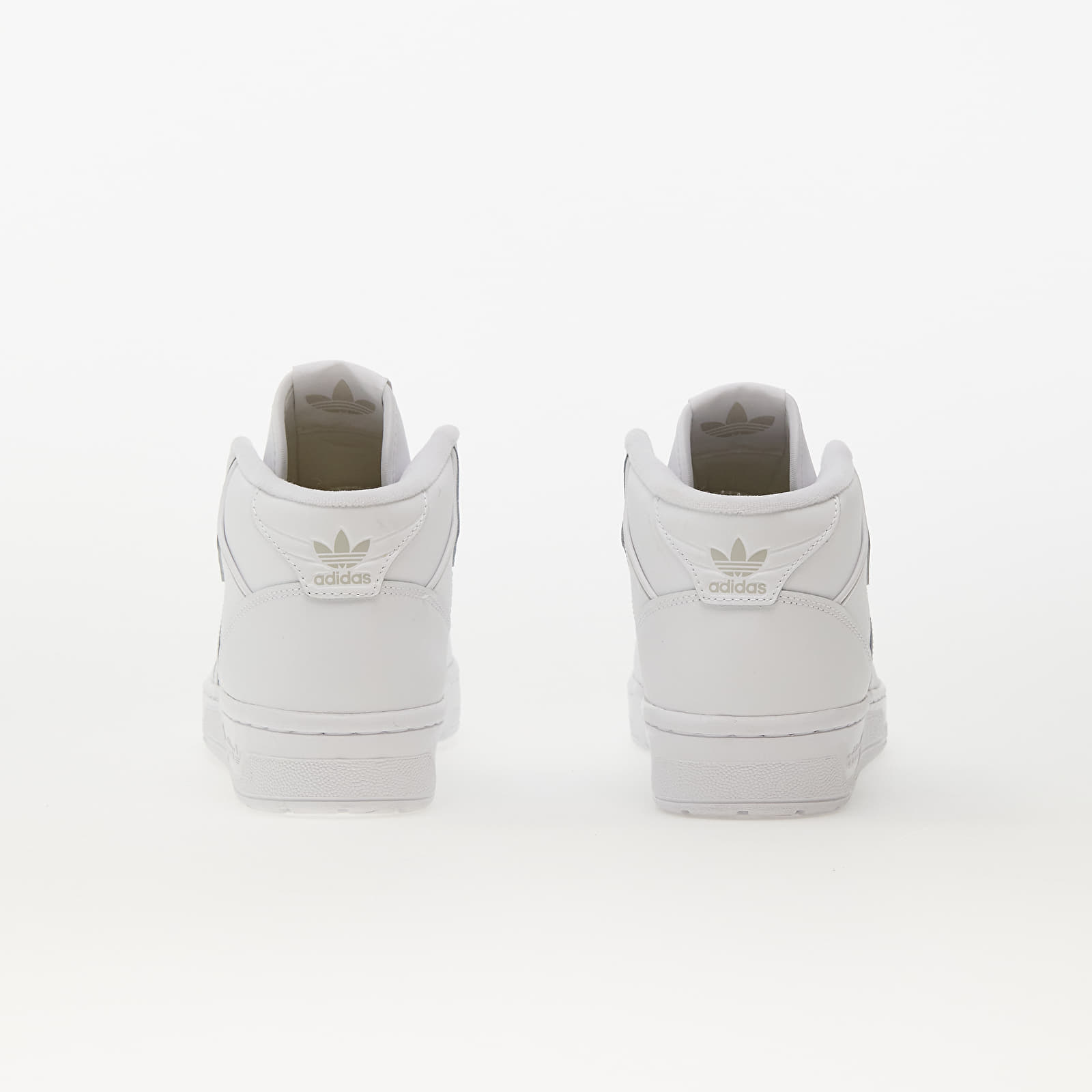 All white top adidas high top