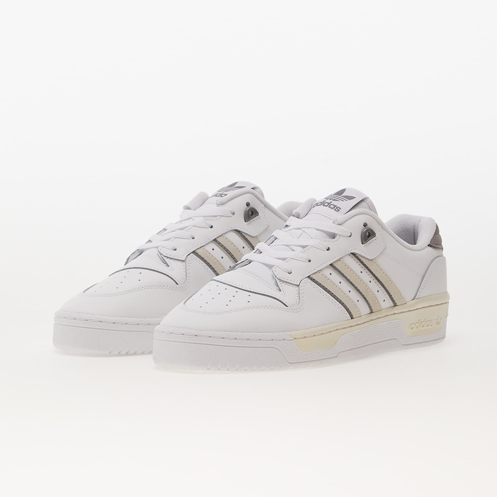 Adidas originals rivalry low trainers in triple white deals