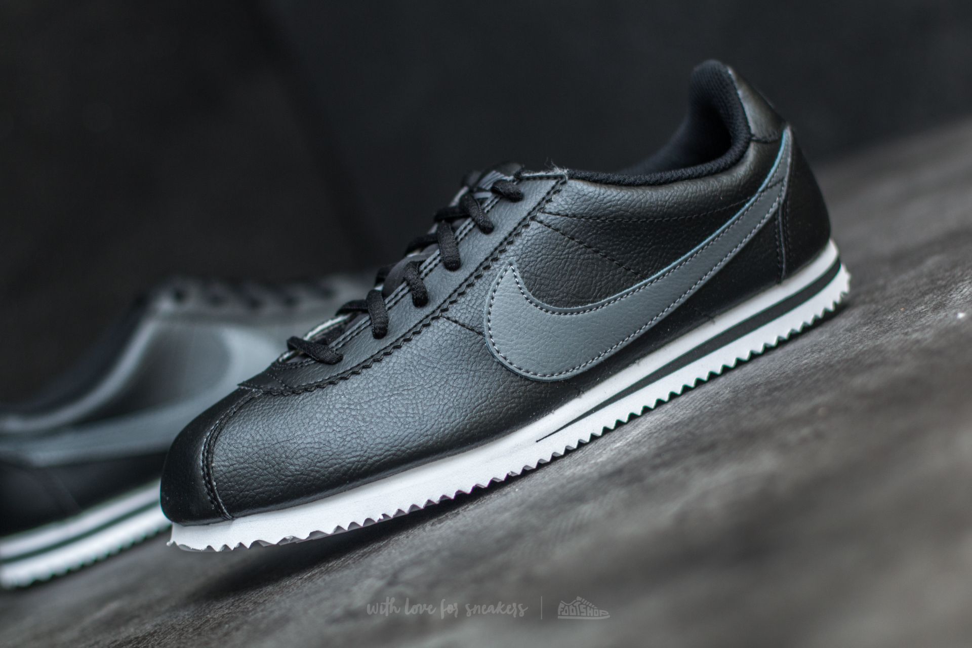 Grey and black nike cortez discount