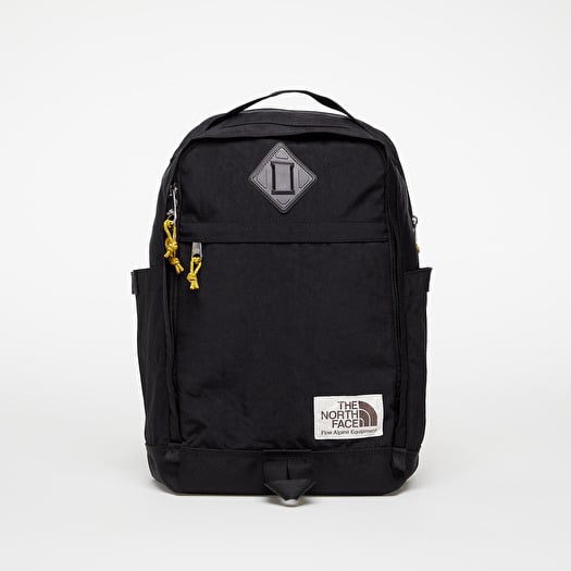 Black and gold north face 2025 backpack