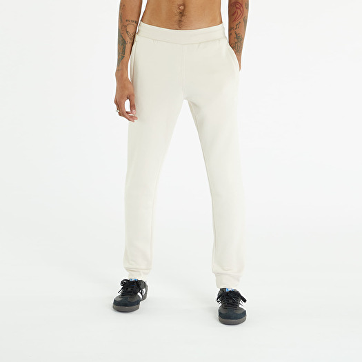 Spodnie dresowe adidas Essentials Pant Wonder White